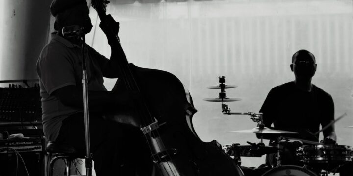 grayscale photo of a jazz band playing live music
